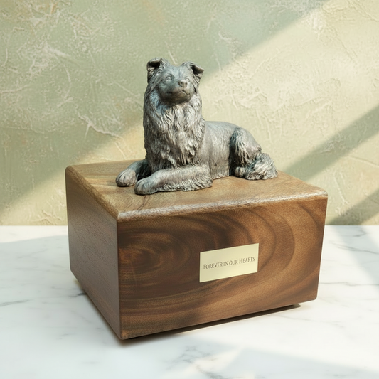 Bronze dog sculpture on a wooden base with 'Forever in Our Hearts' plaque.
