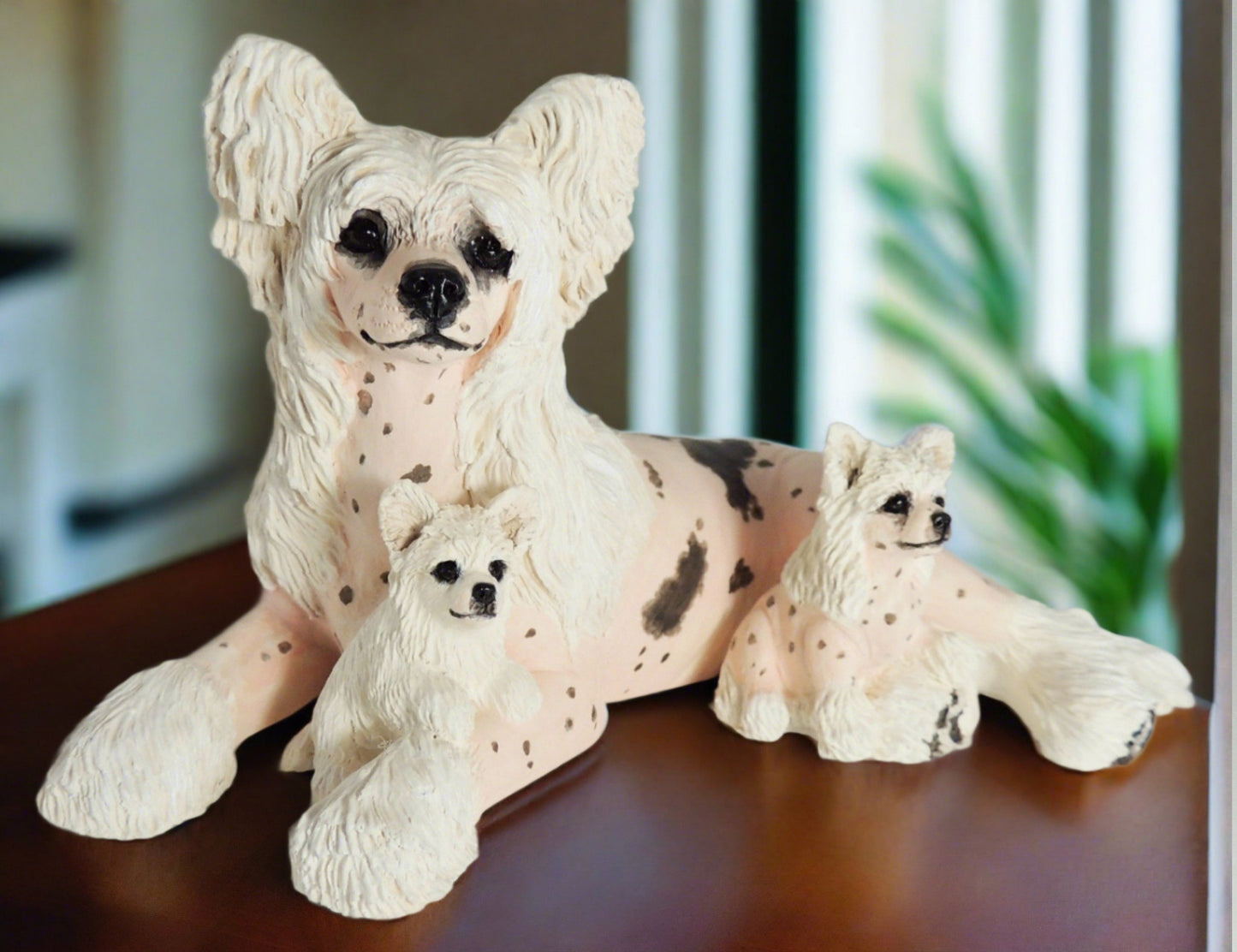 sculpture of chinese crested dog and puppies